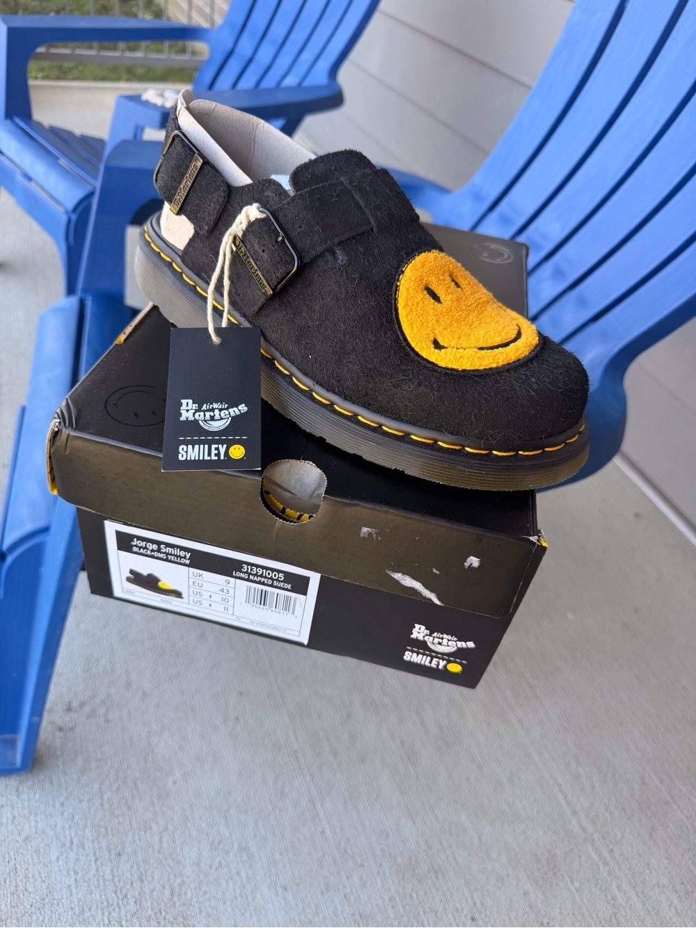 Dr. Martens Black Suede Smiley Clog with Yellow Patch